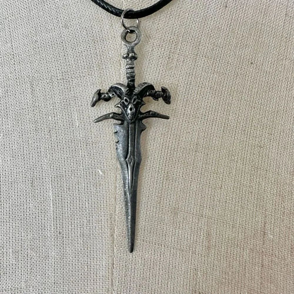 Silver tone sword necklace